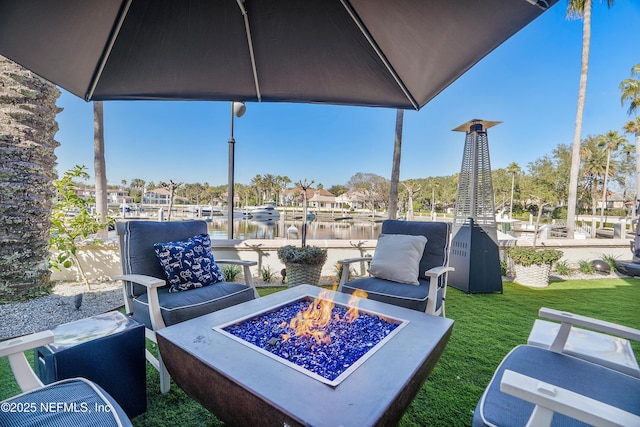 112 Harbourmaster Ct, Ponte Vedra Beach, FL 32082 - view of patio with a fire pit and a water view