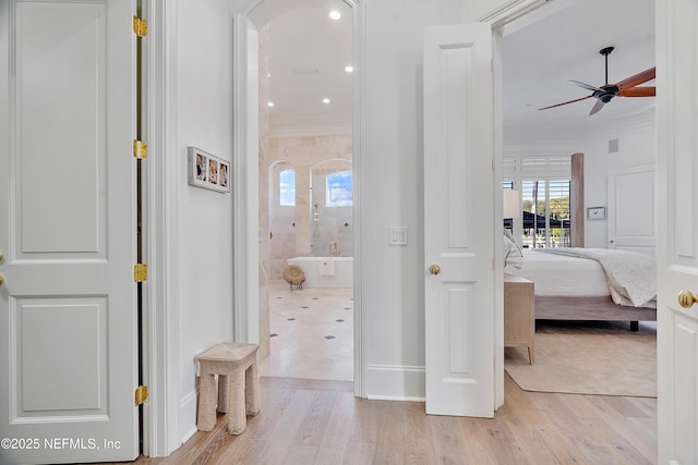112 Harbourmaster Ct, Ponte Vedra Beach, FL 32082 - hall with light wood finished floors, ornamental molding, and recessed lighting