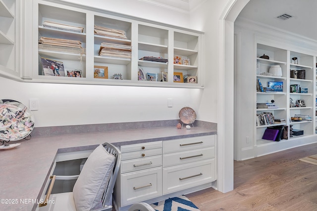 112 Harbourmaster Ct, Ponte Vedra Beach, FL 32082 - detailed view of crown molding, wood finished floors, and arched walkways