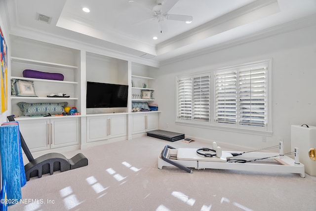 112 Harbourmaster Ct, Ponte Vedra Beach, FL 32082 - exercise area with a tray ceiling, crown molding, ceiling fan, built in features, and carpet floors