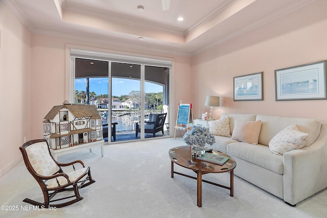 112 Harbourmaster Ct, Ponte Vedra Beach, FL 32082 - carpeted living area with a tray ceiling and crown molding