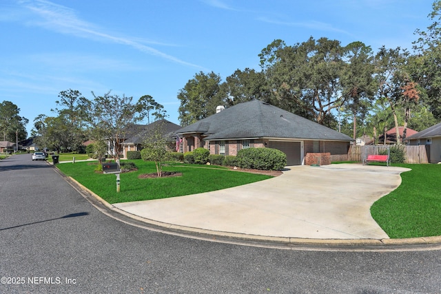 1685 Pinecrest Dr, Fleming Island, FL 32003 - single story home with concrete driveway, an attached garage, and brick siding