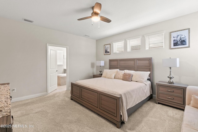 902 Orange Branch Trl, Saint Johns, FL 32259 - bedroom with light carpet, ensuite bath, and a ceiling fan