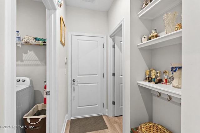 902 Orange Branch Trl, Saint Johns, FL 32259 - washroom with washer / clothes dryer and light wood-style flooring