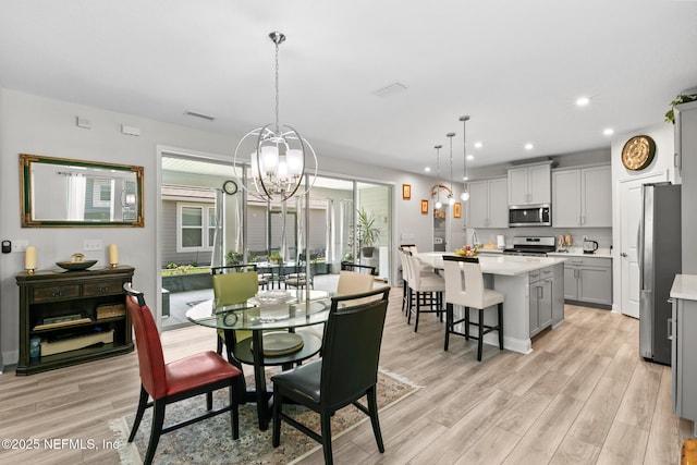902 Orange Branch Trl, Saint Johns, FL 32259 - dining space featuring light wood-style flooring, a chandelier, and recessed lighting