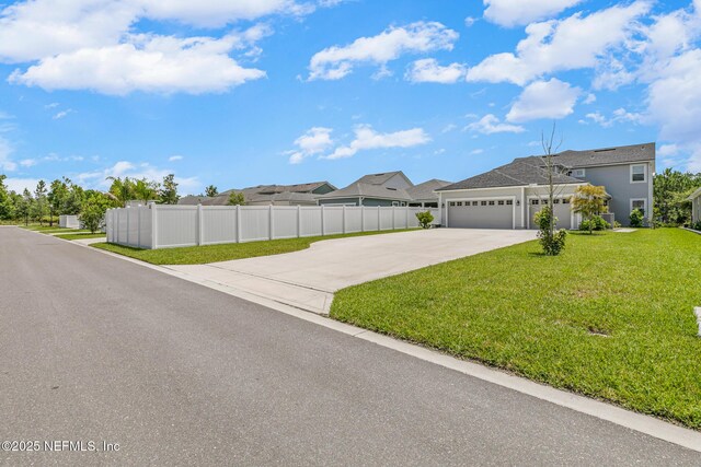 902 Orange Branch Trl, Saint Johns, FL 32259 - view of front of home with concrete driveway, an attached garage, and a residential view