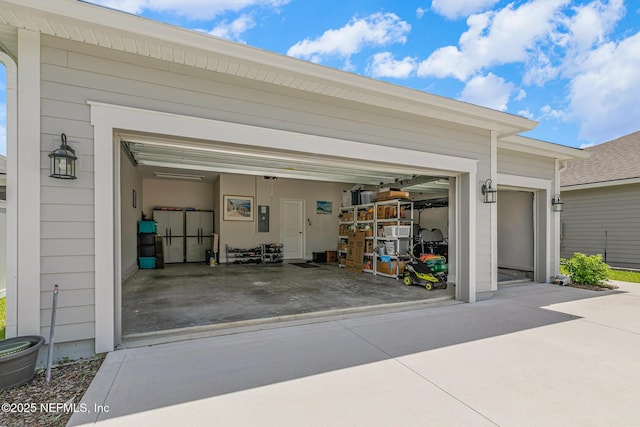 902 Orange Branch Trl, Saint Johns, FL 32259 - garage featuring driveway and electric panel