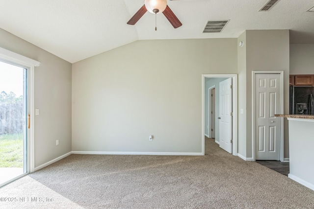 95886 Graylon Dr, Yulee, FL 32097 - unfurnished living room featuring carpet, ceiling fan, and lofted ceiling