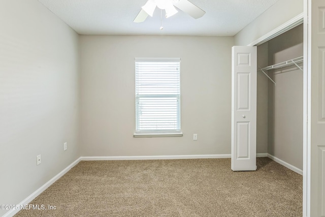 95886 Graylon Dr, Yulee, FL 32097 - unfurnished bedroom featuring carpet flooring, multiple windows, and a closet