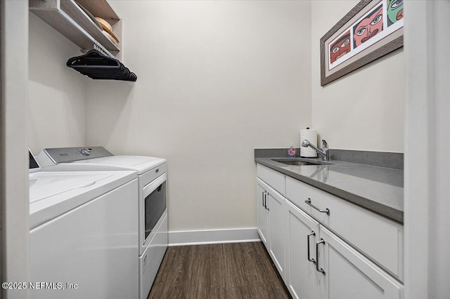 1639 Maritime Oak Dr, Atlantic Beach, FL 32233 - washroom featuring washer and dryer, dark wood finished floors, and cabinet space