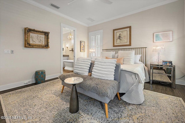 1639 Maritime Oak Dr, Atlantic Beach, FL 32233 - bedroom featuring dark wood finished floors, crown molding, ensuite bath, and a ceiling fan