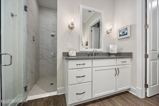 1639 Maritime Oak Dr, Atlantic Beach, FL 32233 - bathroom featuring wood finished floors, a marble finish shower, and vanity