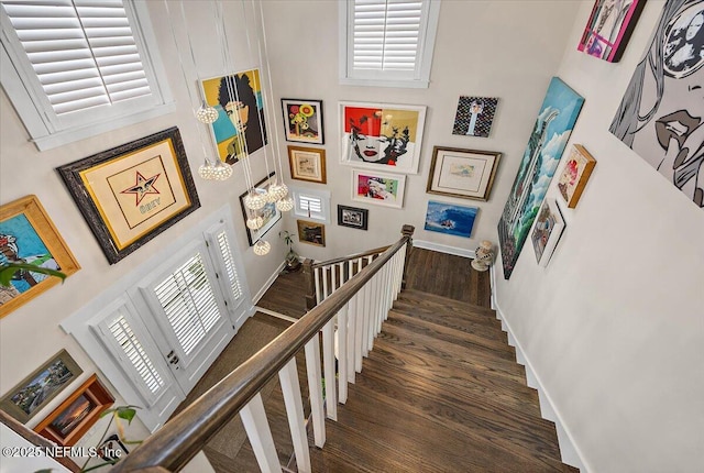 1639 Maritime Oak Dr, Atlantic Beach, FL 32233 - staircase with a towering ceiling and wood finished floors