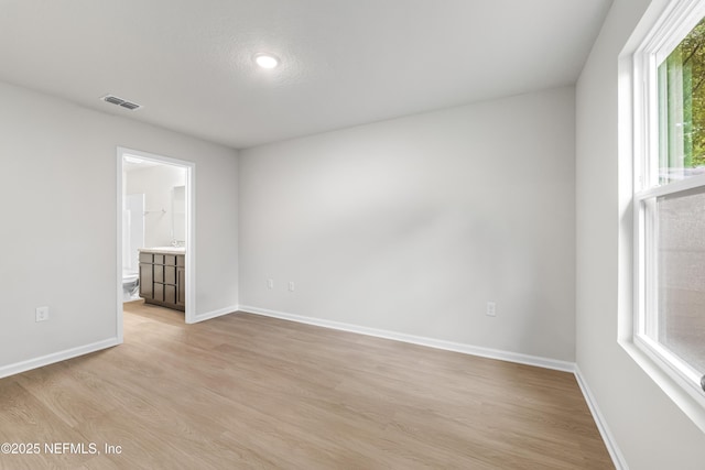 8077 Devoe St, Jacksonville, FL 32220 - empty room featuring light wood-type flooring and baseboards