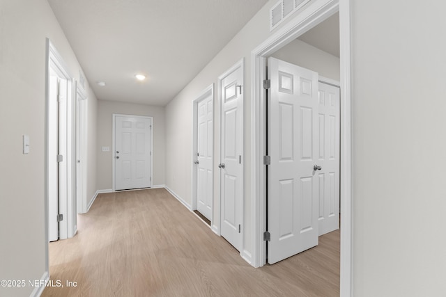 8077 Devoe St, Jacksonville, FL 32220 - hall featuring light wood-type flooring and recessed lighting
