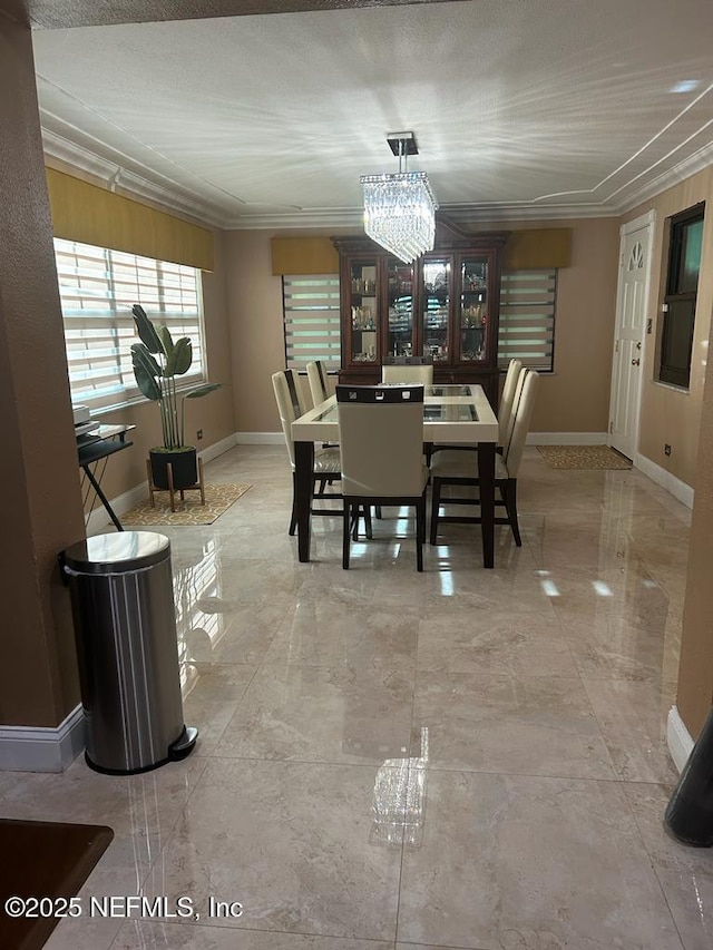 2788 SW 46th Ct, Fort Lauderdale, FL 33312 - dining area featuring crown molding, a chandelier, and light marble finish flooring