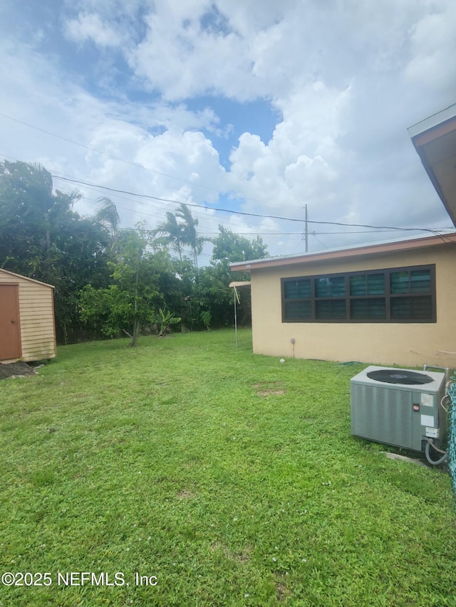 2788 SW 46th Ct, Fort Lauderdale, FL 33312 - view of green lawn featuring a storage unit