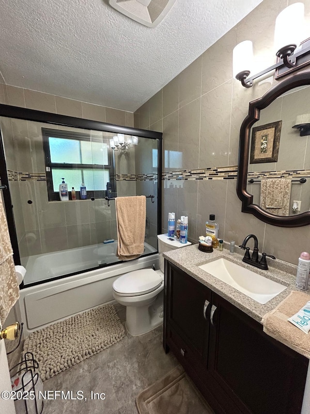 2788 SW 46th Ct, Fort Lauderdale, FL 33312 - bathroom featuring vanity, tile walls, enclosed tub / shower combo, and a textured ceiling