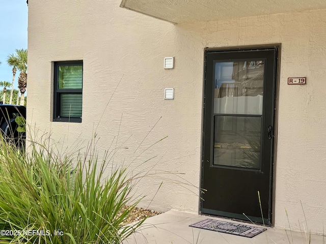 4250 A1A Unit R19, Saint Augustine, FL 32080 - property entrance featuring stucco siding