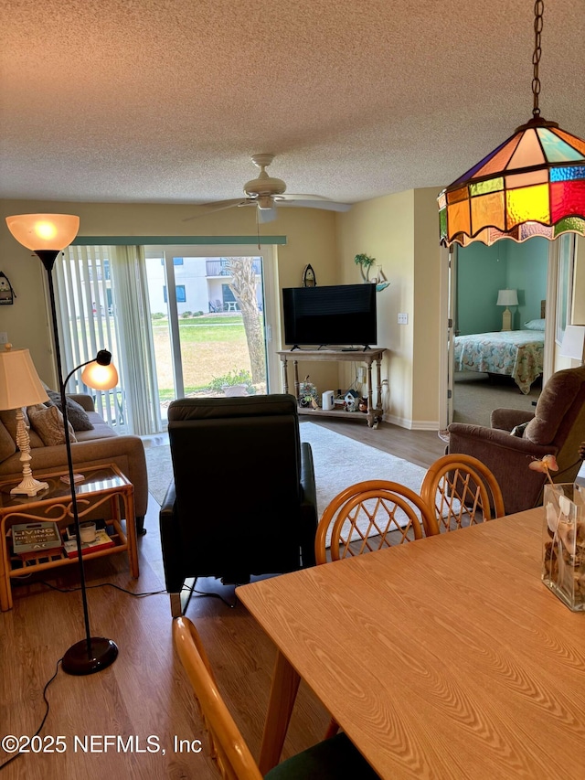 4250 A1A Unit R19, Saint Augustine, FL 32080 - dining area with wood finished floors, ceiling fan, and a textured ceiling