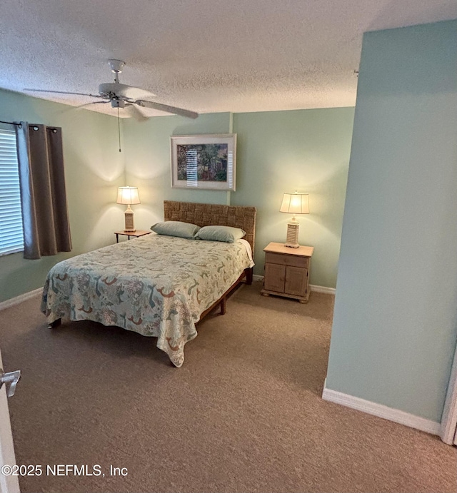4250 A1A Unit R19, Saint Augustine, FL 32080 - carpeted bedroom featuring a textured ceiling and ceiling fan