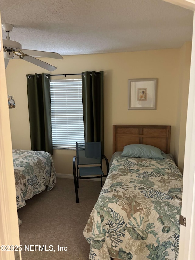 4250 A1A Unit R19, Saint Augustine, FL 32080 - carpeted bedroom featuring ceiling fan and baseboards