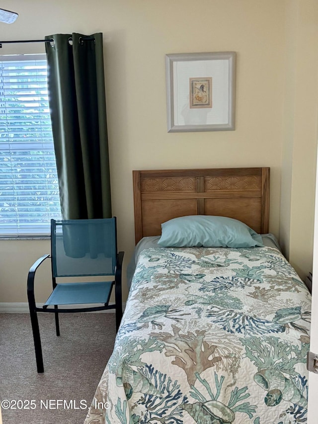4250 A1A Unit R19, Saint Augustine, FL 32080 - bedroom with carpet flooring and multiple windows
