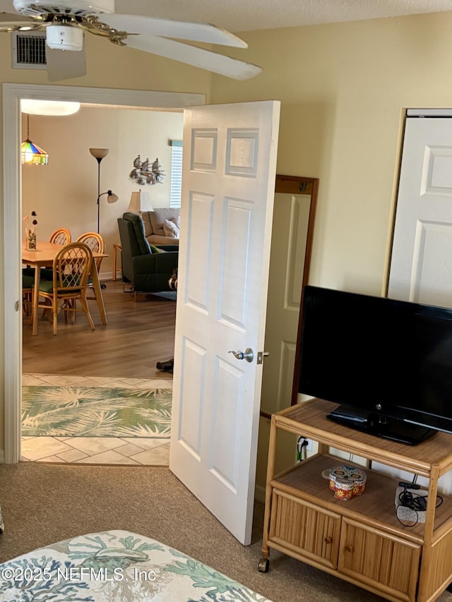 4250 A1A Unit R19, Saint Augustine, FL 32080 - living area with ceiling fan