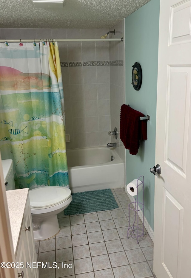 4250 A1A Unit R19, Saint Augustine, FL 32080 - bathroom with vanity, tile patterned flooring, shower / bathtub combination with curtain, and a textured ceiling