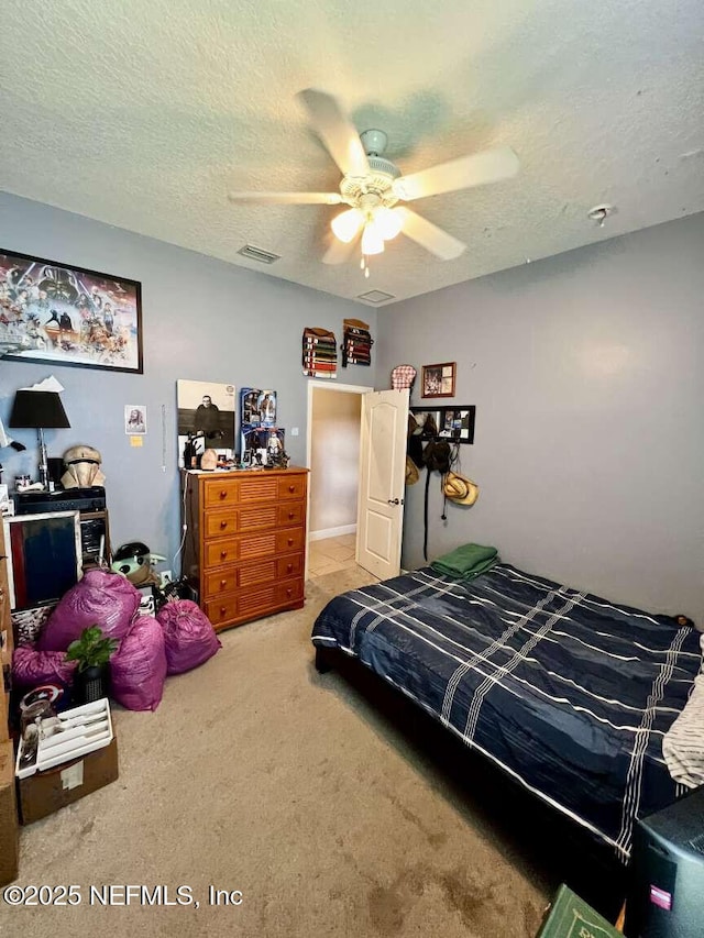 16325 Magnolia Bluff Dr, Montverde, FL 34756 - bedroom with carpet, a textured ceiling, and ceiling fan