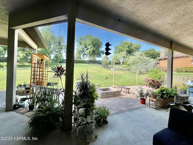 16325 Magnolia Bluff Dr, Montverde, FL 34756 - view of patio / terrace featuring an outdoor fire pit