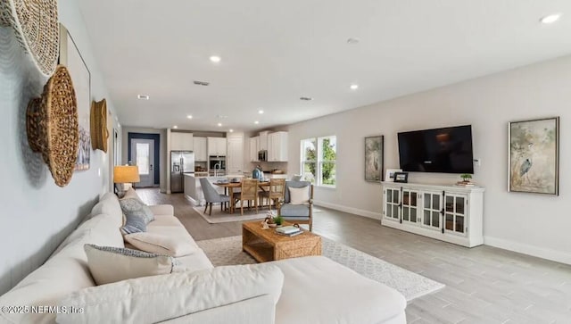 2769 Seasons Rd, Green Cove Springs, FL 32043 - living room featuring recessed lighting and light wood finished floors