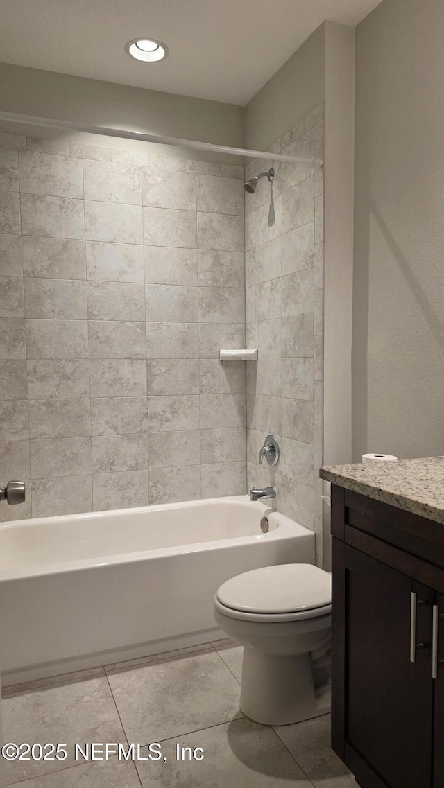 228 Clayton St, Brandon, FL 33511 - bathroom featuring vanity, shower / bath combination, and tile patterned floors