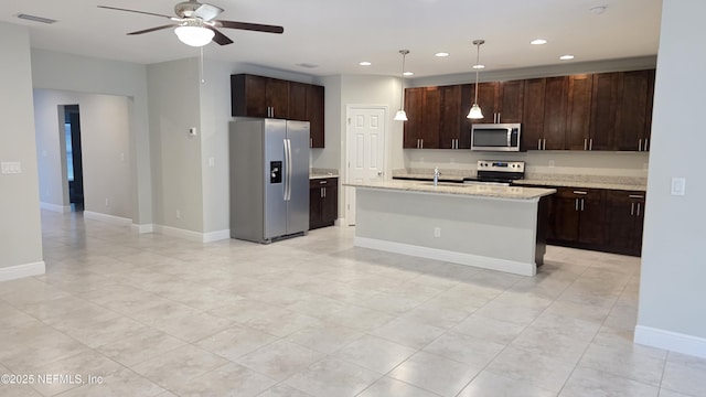 228 Clayton St, Brandon, FL 33511 - kitchen featuring appliances with stainless steel finishes, ceiling fan, dark brown cabinets, decorative light fixtures, and recessed lighting
