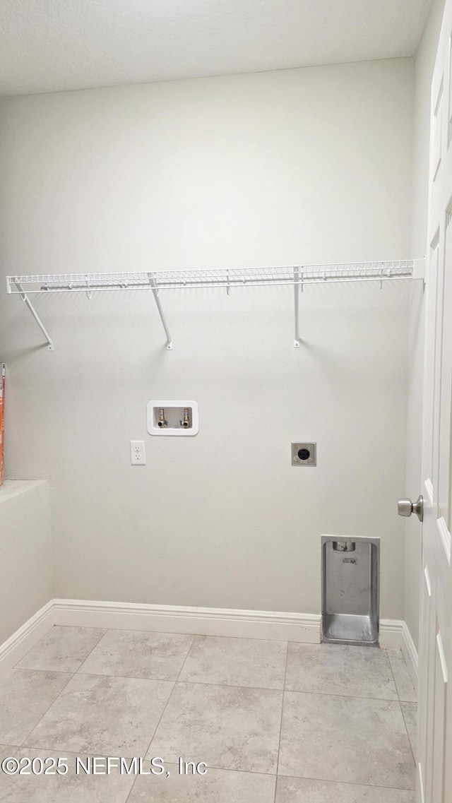 228 Clayton St, Brandon, FL 33511 - laundry area with electric dryer hookup and hookup for a washing machine