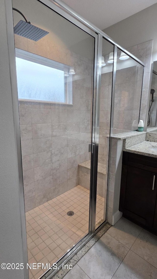 228 Clayton St, Brandon, FL 33511 - full bathroom with a stall shower, vanity, and tile patterned flooring