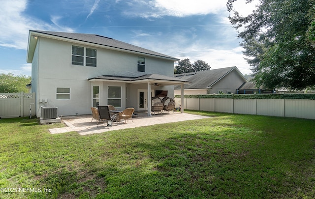 1361 Wekiva Way, Saint Augustine, FL 32092 - back of property with a fenced backyard, stucco siding, a patio, and a shingled roof