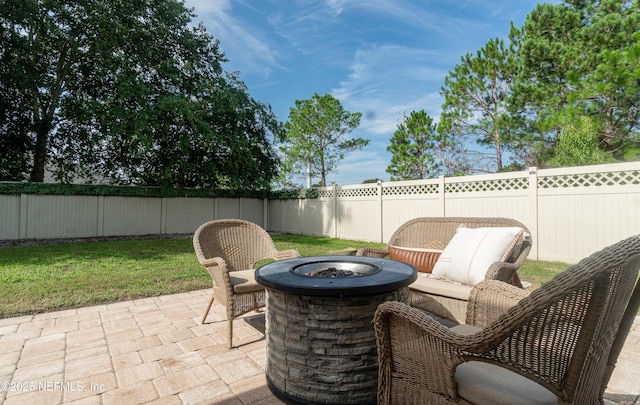 1361 Wekiva Way, Saint Augustine, FL 32092 - fenced backyard featuring a fire pit and a patio area