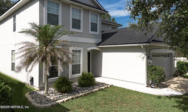1361 Wekiva Way, Saint Augustine, FL 32092 - view of front of property with a garage, a shingled roof, stucco siding, and driveway