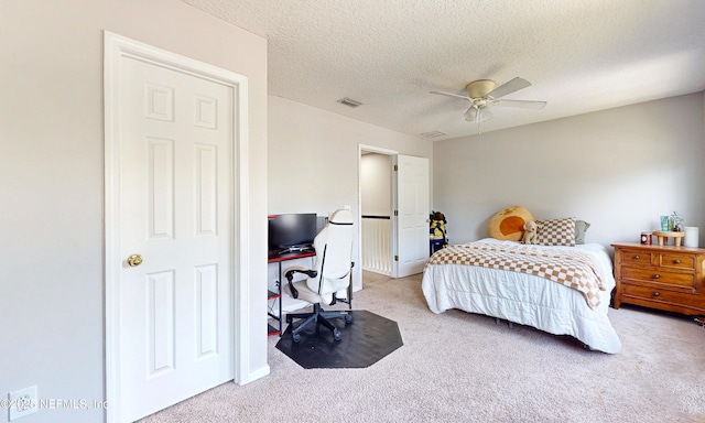 1361 Wekiva Way, Saint Augustine, FL 32092 - bedroom featuring carpet flooring, an office area, a textured ceiling, and a ceiling fan