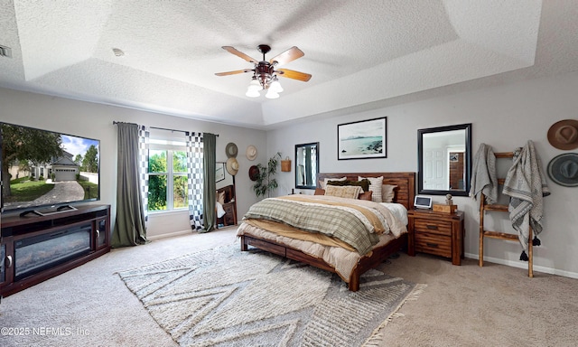 1361 Wekiva Way, Saint Augustine, FL 32092 - carpeted bedroom with a raised ceiling, a textured ceiling, and a ceiling fan