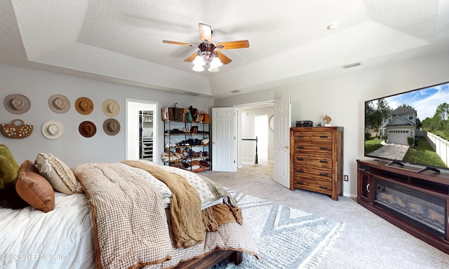 1361 Wekiva Way, Saint Augustine, FL 32092 - bedroom featuring a raised ceiling, light carpet, a ceiling fan, and a textured ceiling