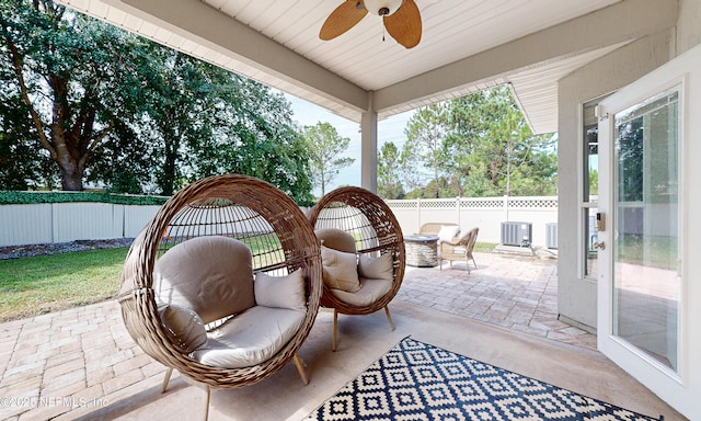 1361 Wekiva Way, Saint Augustine, FL 32092 - fenced backyard with a ceiling fan and a patio area