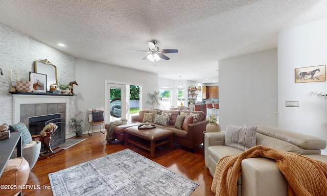 1361 Wekiva Way, Saint Augustine, FL 32092 - living area featuring a ceiling fan, a fireplace, wood finished floors, a textured ceiling, and recessed lighting