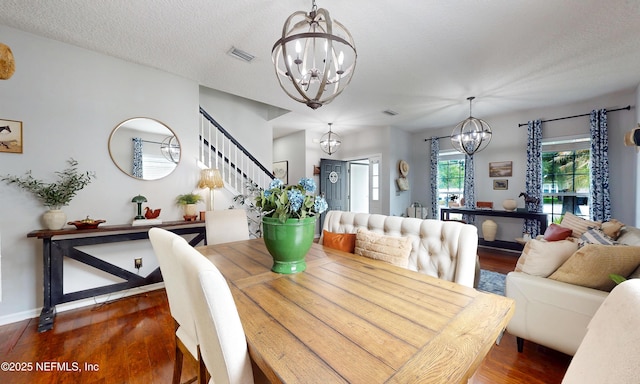 1361 Wekiva Way, Saint Augustine, FL 32092 - dining area with a chandelier, stairs, and wood finished floors