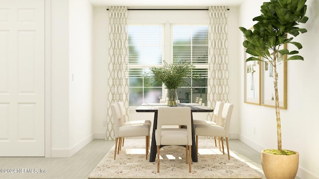 39 Hogan Ct, Saint Augustine, FL 32092 - dining room featuring baseboards and light wood-type flooring