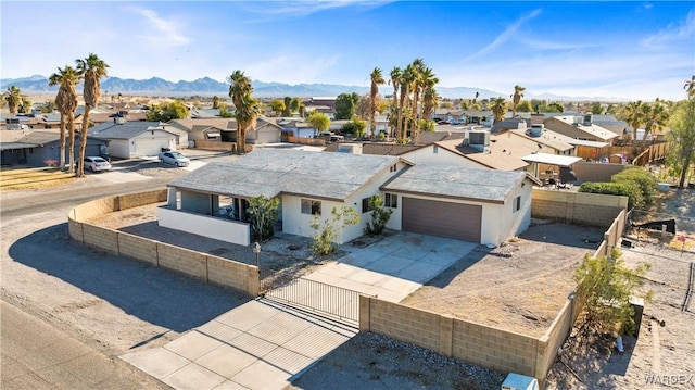 bird's eye view featuring a residential view and a mountain view