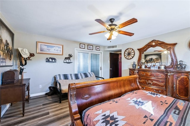 4390 El Camino Rd, Bullhead City, AZ 86429 - bedroom with wood finished floors and ceiling fan