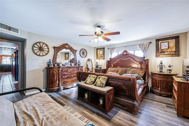 4390 El Camino Rd, Bullhead City, AZ 86429 - bedroom featuring wood finished floors and a ceiling fan