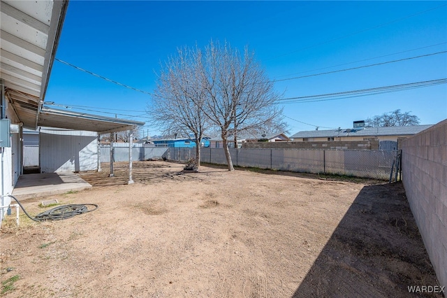 view of yard with a fenced backyard